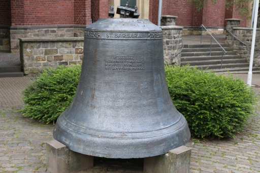 St. Barbara bell in front of the church St. Peter and Paul